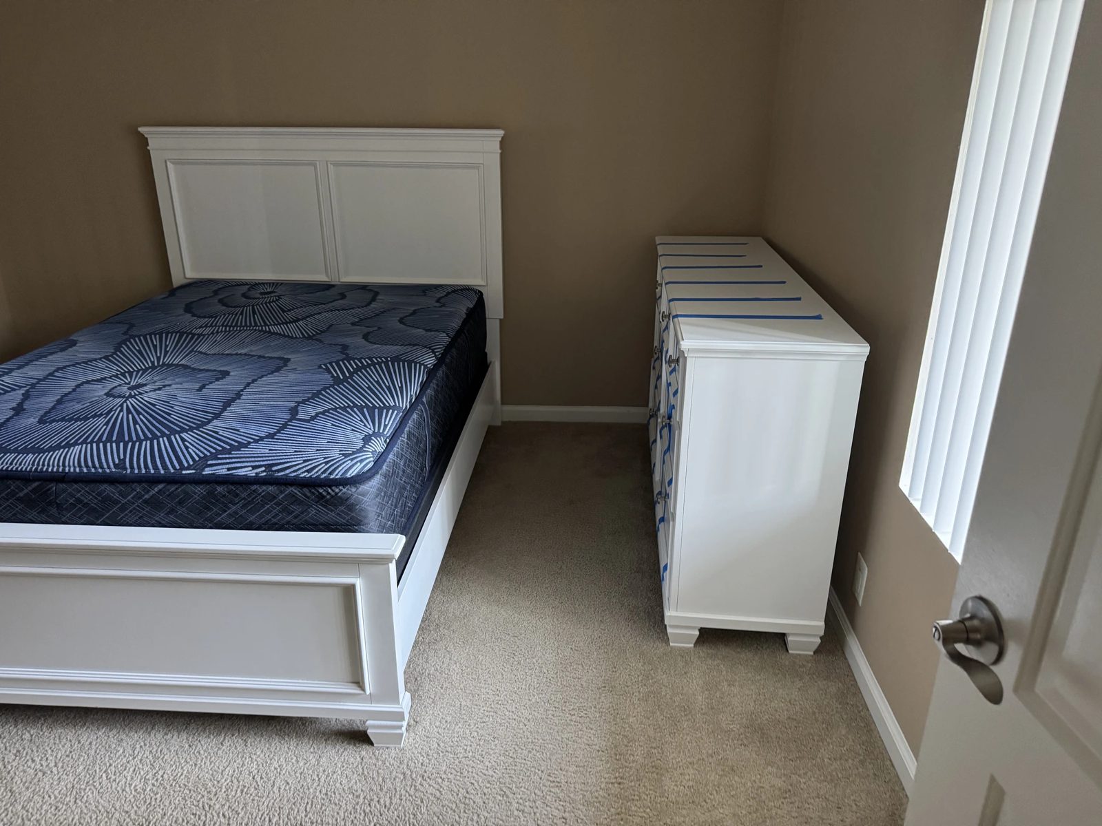 A bedroom set placed and assembled by the Home Team crew