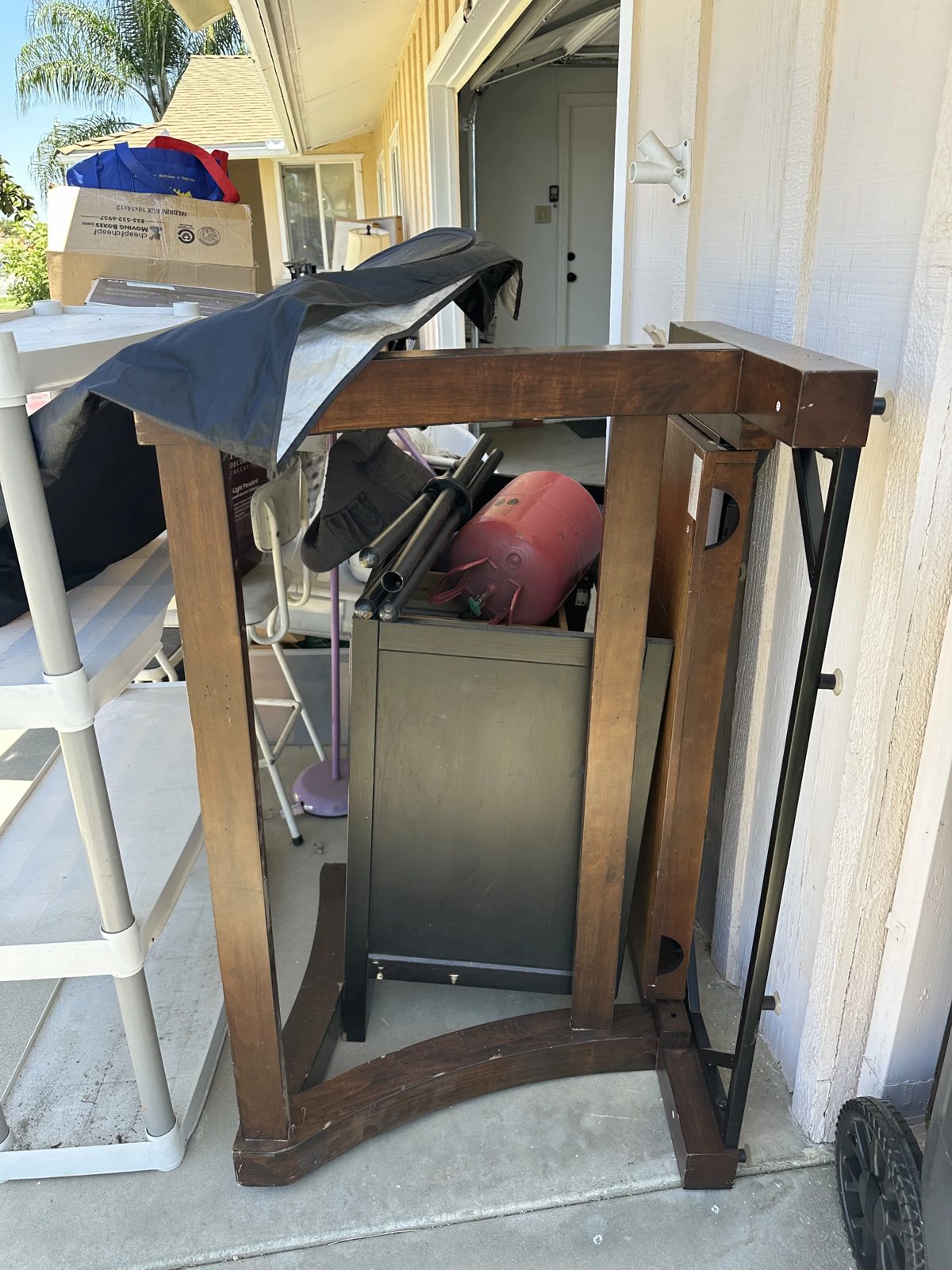 Furniture and household items staged for a cleanout job